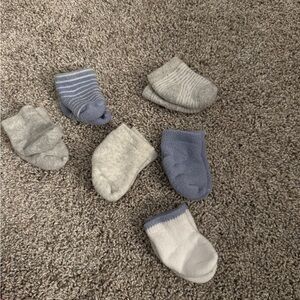 Gently used 0-3M Carters socks